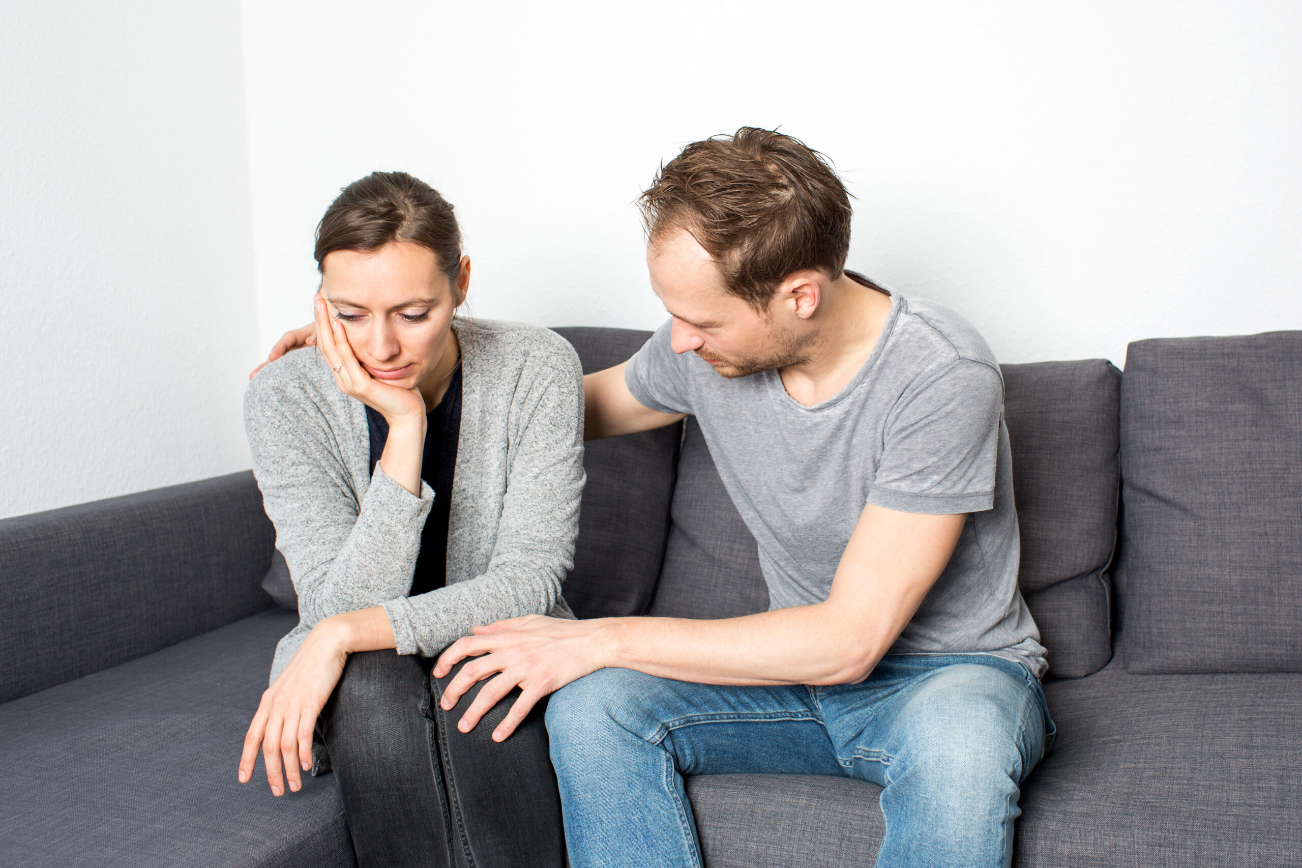 Man talking to his partner about addiction compassionately